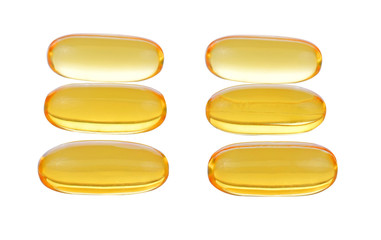 Close up of food supplement oil filled capsules suitable for: fish oil, omega 3, omega 6, omega 9, evening primrose, borage oil, flax seeds oil, vitamin A, vitamin D, vitamin D3, vitamin E