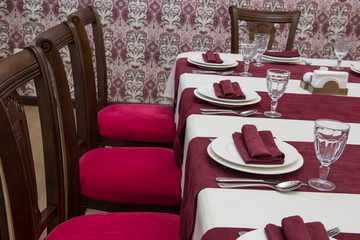 serving banquet table in a luxurious restaurant in red and white style