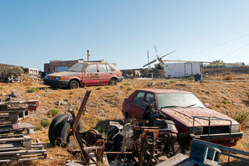 Wrecked cars and plane in the island of Patmos, Greece
