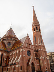 Budapest, Hungary - Mar 9th 2019: Szilágyi Dezső Square Reformed Church is a Protestant church in Budapest. It was built by Samu Pecz from 1894 to 1896. - obrazy, fototapety, plakaty