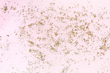 Abstract glitter pink background festive Christmas decor for greetings with copy space flat lay top view