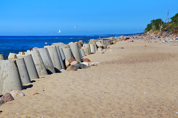 View of the sand beach on the Baltic Sea coast at summer.