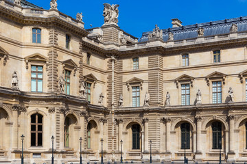 Details of the facade of the Louvre, Paris, France. Is the world's largest art museum and is housed in the Louvre Palace, originally built in the late 12th to 13th century.