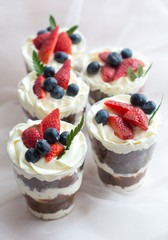 cake with cream and fresh berries