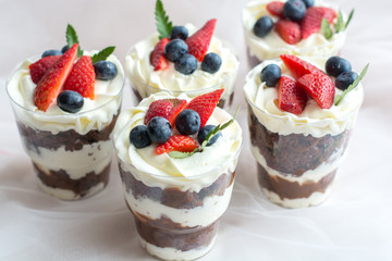 cake with cream and fresh berries