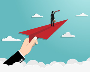 Obraz premium Man on paper plane in the sky