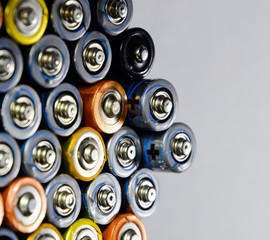 Salt and alkaline batteries, source of energy for portable technology. AAA and AA batteries
