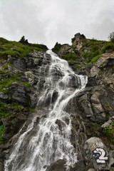 Fototapeta na wymiar Capra waterfall from the Fagaras mountains