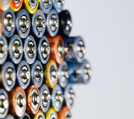 Salt and alkaline batteries, source of energy for portable technology. AAA and AA batteries