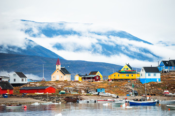 Colorful houses on the cliffs in Saqqaq village, western Greenland.