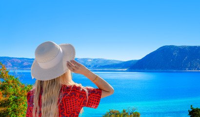 The girl with white hat looking Lake Salda from hill, Burdur, Turkey