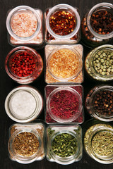 assortment of spices in glass on table. Food and cuisine ingredients and peppers