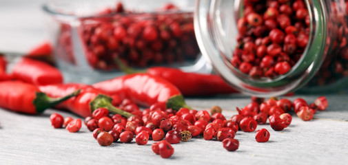 red hot bird chili pepper with pepper corns