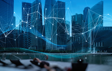 Wireless network and Connection technology concept with Abstract Singapore city background