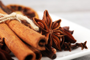 cinnamon, staranise and cloves. winter spices on wooden table