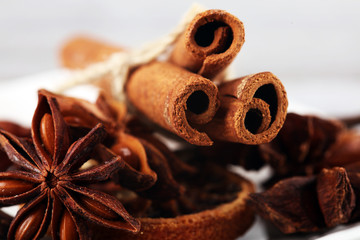cinnamon, staranise and cloves. winter spices on wooden table
