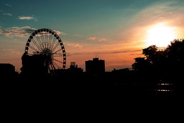 sunset in the city and roller coaster 