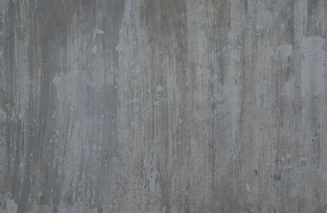 Full frame image of the old shabby beton wall covered with gray paint. High resolution texture for background, poster, collage in vintage, loft or grunge style