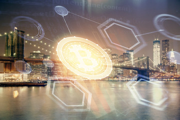 Multi exposure of cryptocurrency theme hologram drawing and city veiw background. Concept of blockchain and bitcoin.