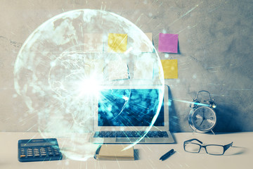 Double exposure of business theme icons and work space with computer background. Concept of success.