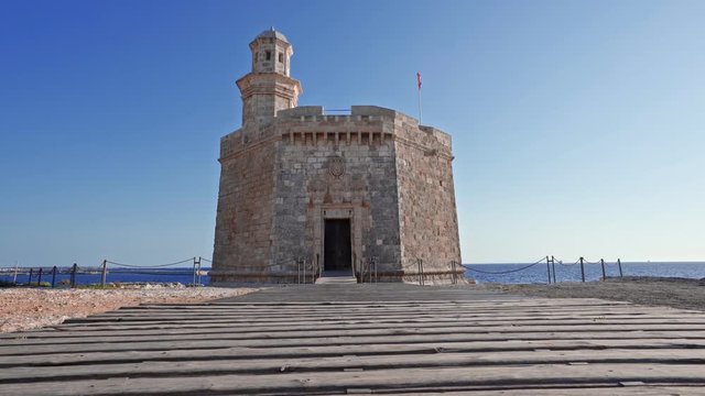 Sant Nicolau Castle in beautiful mediterranean town of Ciutadella in Menorca island. The Sant Nicolau Castle is strategically located at the entrance of the Ciutadella port
