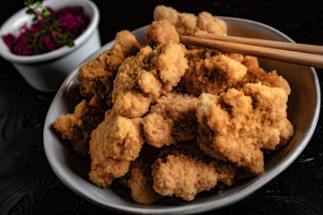 Delicious crispy fried chicken breast strips.