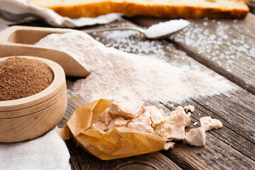 bread ingredients on weathered wooden table