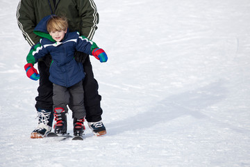 Fototapeta na wymiar boy learning to ski