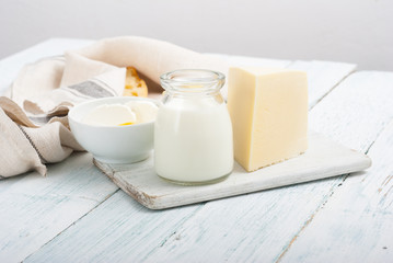 dairy products on old white wooden table