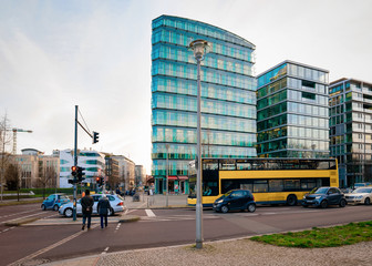 Street bus car traffic and modern architecture on Potsdamer Platz