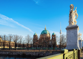 Statue and Berlin Cathedral at Spree River quay