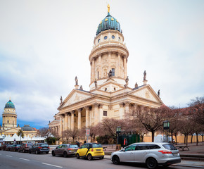 Fototapeta premium Road with car traffic at Evening Christmas market in Gendarmenmarkt