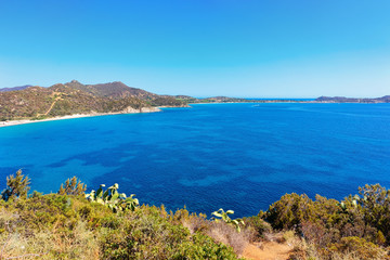 Fototapeta na wymiar Landscape with beach at Mediterranean Sea in Villasimius with cacti