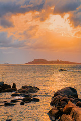 Romantic sunrise in Capriccioli Beach of Costa Smeralda