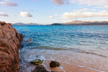 Romantic morning sunrise in Capriccioli Beach in Costa Smeralda