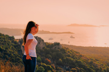 Sunrise or sunset and young lady at Porto Rotondo