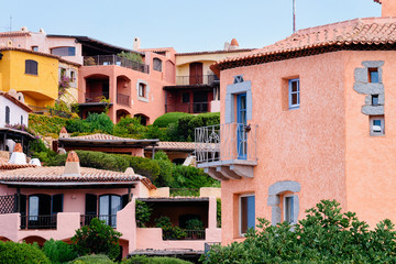 Fototapeta na wymiar Windows and balconies of residential house complex of Porto Cervo