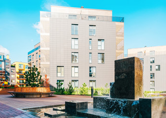 Fountain at architectural complex of residential building quarter