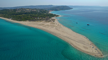 Aerial drone photo of iconic exotic sandy peninsula and sandy beach of Possidi with turquoise clear sea, Kassandra, Halkidiki, North Greece