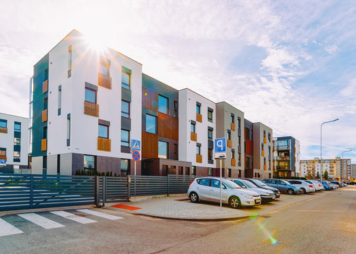 Apartment House And Home Residential Building Street Parking Sunset