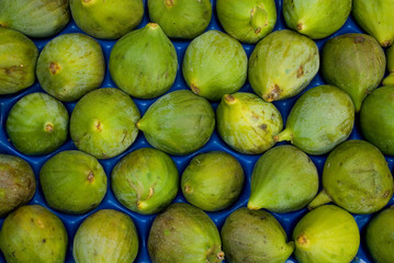 basket of green figs, sweet, ripe, at local vegetable market, agriculture, food, diet, vitamins,...