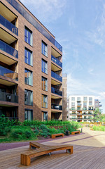 Benches at Modern architectural complex of apartment residential buildings