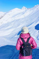 Fototapeta na wymiar Woman with backpack in Hintertux Glacier Austria