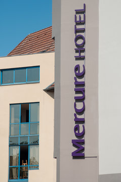 Colmar - France - 24 August 2019 - Closeup of mercure hotel sign on modern building facade in the street