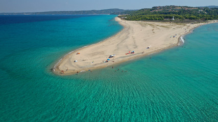 Aerial drone photo of iconic exotic sandy peninsula and sandy beach of Possidi with turquoise clear sea, Kassandra, Halkidiki, North Greece