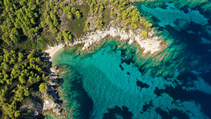Aerial drone photo of tropical Caribbean bay with white sand beach and beautiful turquoise and sapphire clear sea