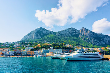 Fototapeta premium Marina with yachts in Capri Island town at Naples Italy