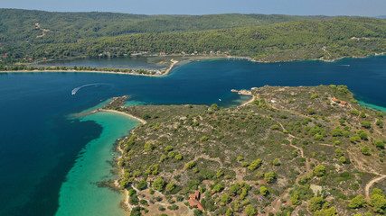 Aerial drone view of iconic Livari beach in natural exotic bay of Vourvourou, Sithonia peninsula, Halkidiki, Greece