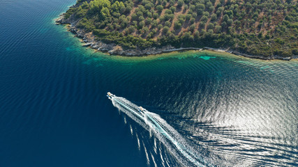 Aerial drone photo of turquoise bay near famous Vourvourou and Diaporos island, Sithonia peninsula,...