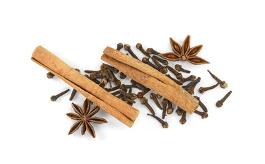 Cinnamon sticks, cloves and anise star isolated on white background close up. Spice Cinnamon sticks dried cloves and anise star.